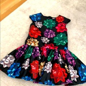 Girls wrapping paper bows holiday dress